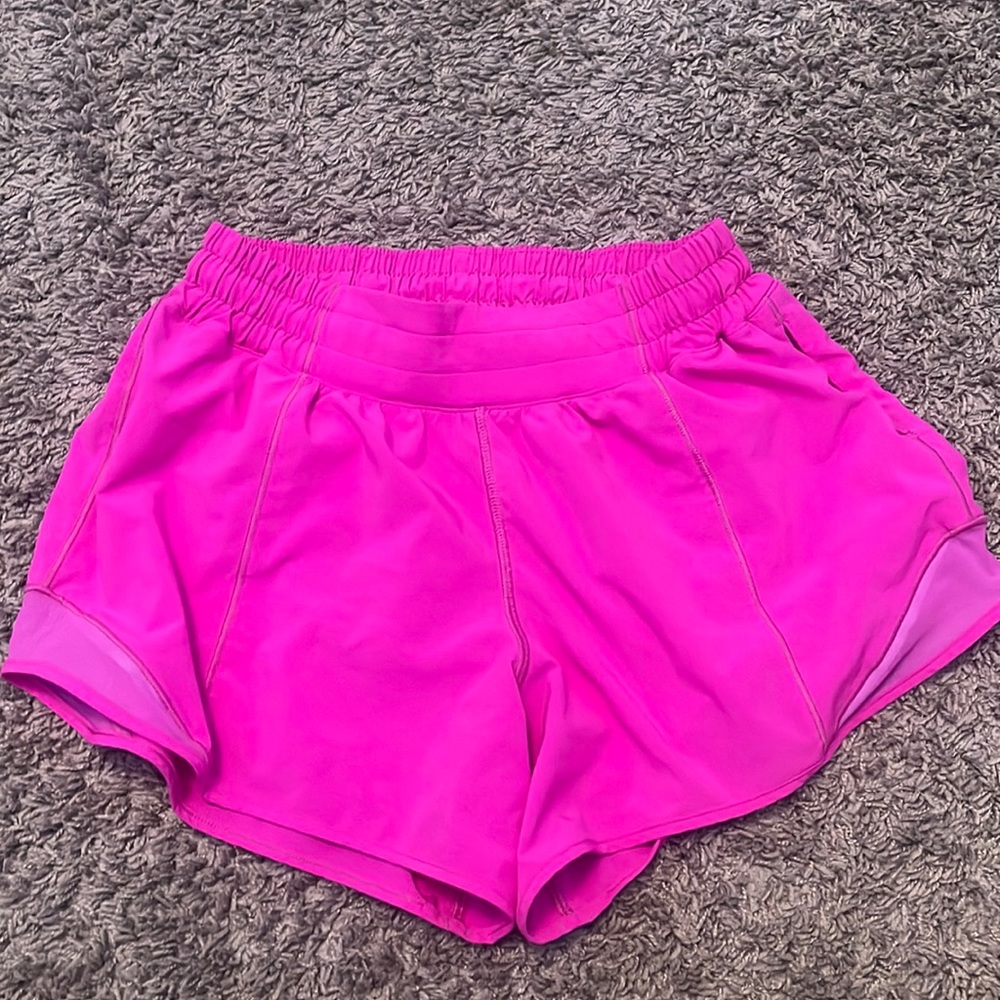 Pink Lululemon shorts size 4 never been worn.
